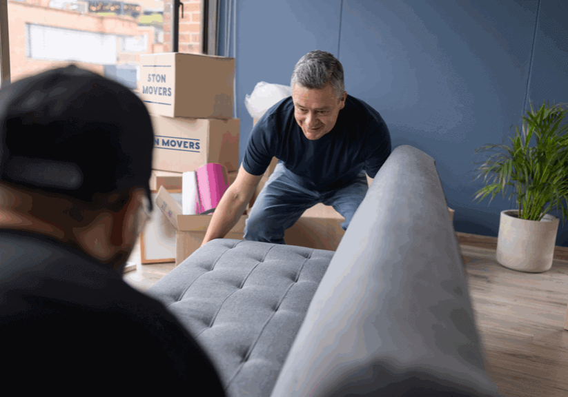 moving out a sofa with boxes