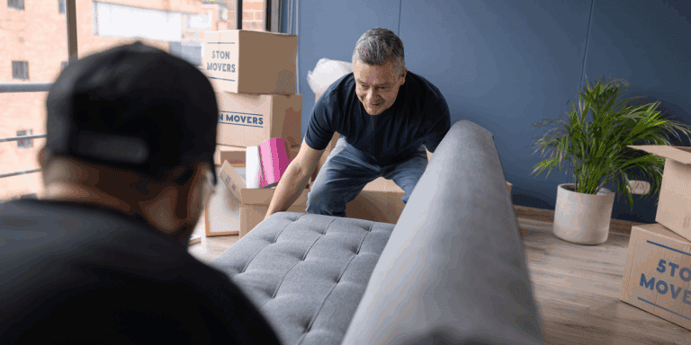 moving out a sofa with boxes